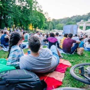 outdoor cinema bicycle couple watching movies
