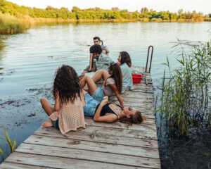 hungarian summer young people hanging around a lake and chilling