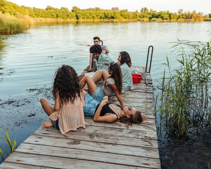 hungarian summer young people hanging around a lake and chilling