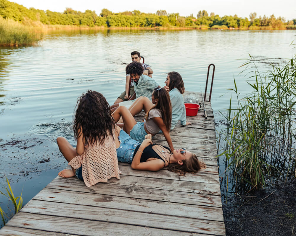 hungarian summer young people hanging around a lake and chilling